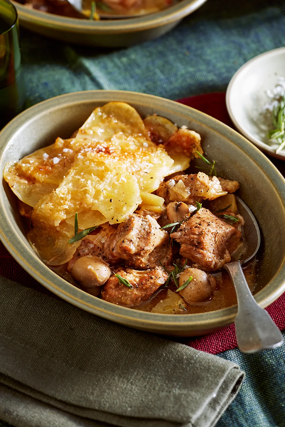 Pork, apple and cider stew with crispy potatoes