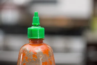 empty sriracha bottle
