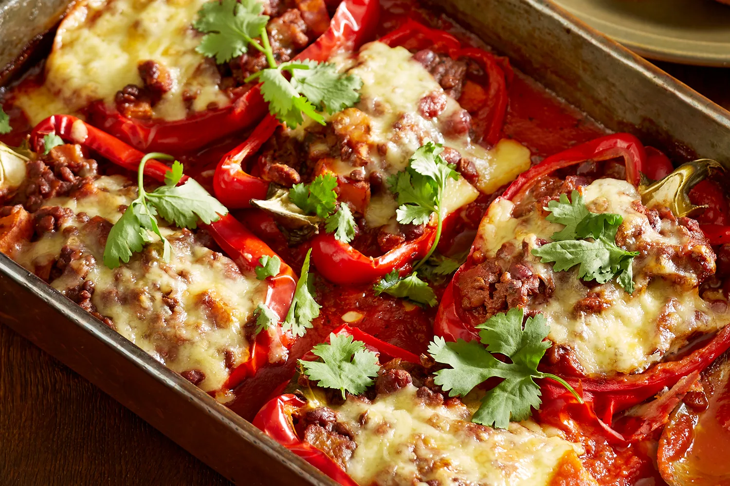 Chilli con lentil stuffed capsicums