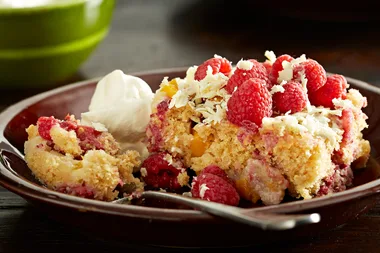 Simple white chocolate, peach and raspberry pudding