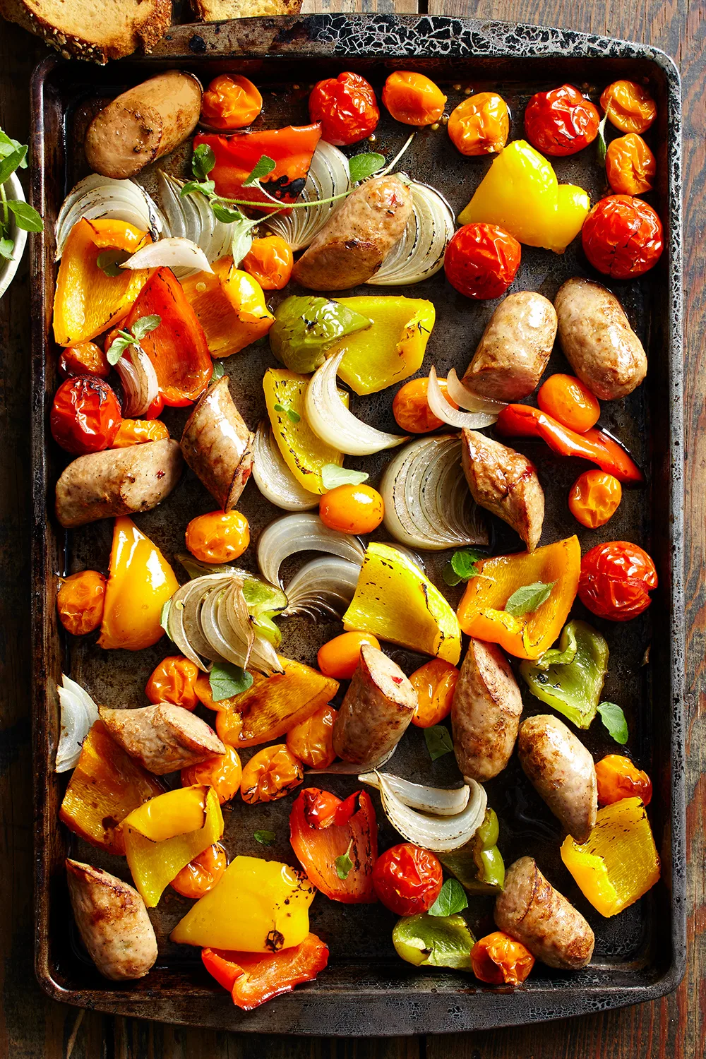 Roasted chicken sausages and capsicum tray bake