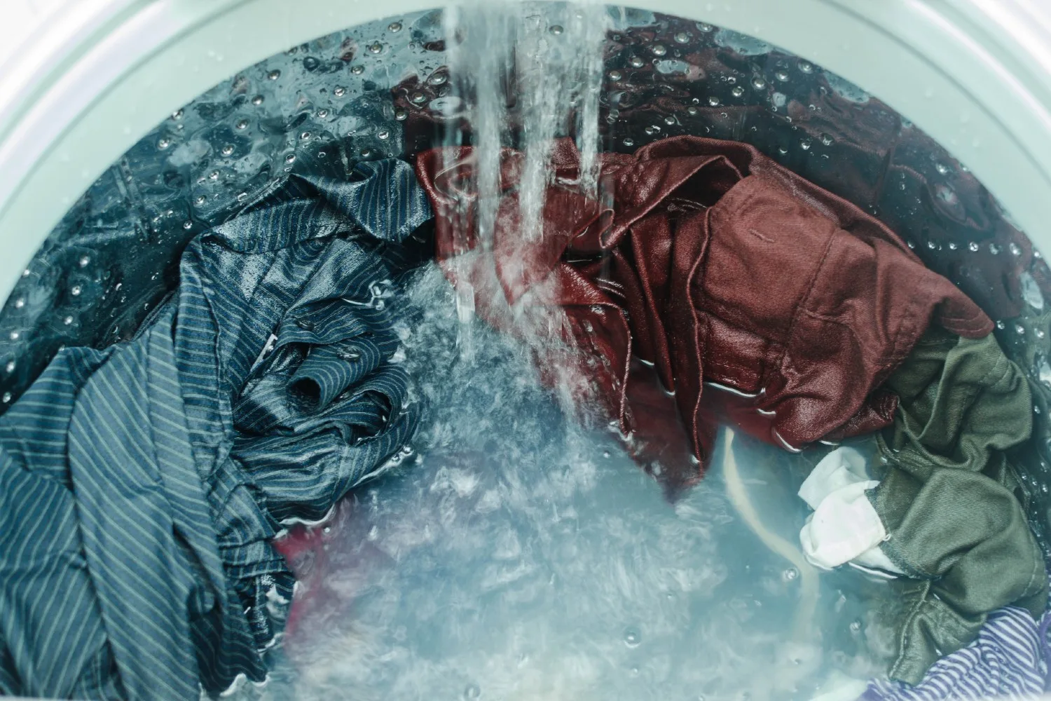 Drying wet clothes can take less time if you add an extra spin cycle to remove more moisture.