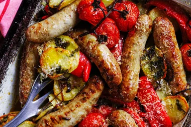 Tray-baked spicy sausages, potato and tomato