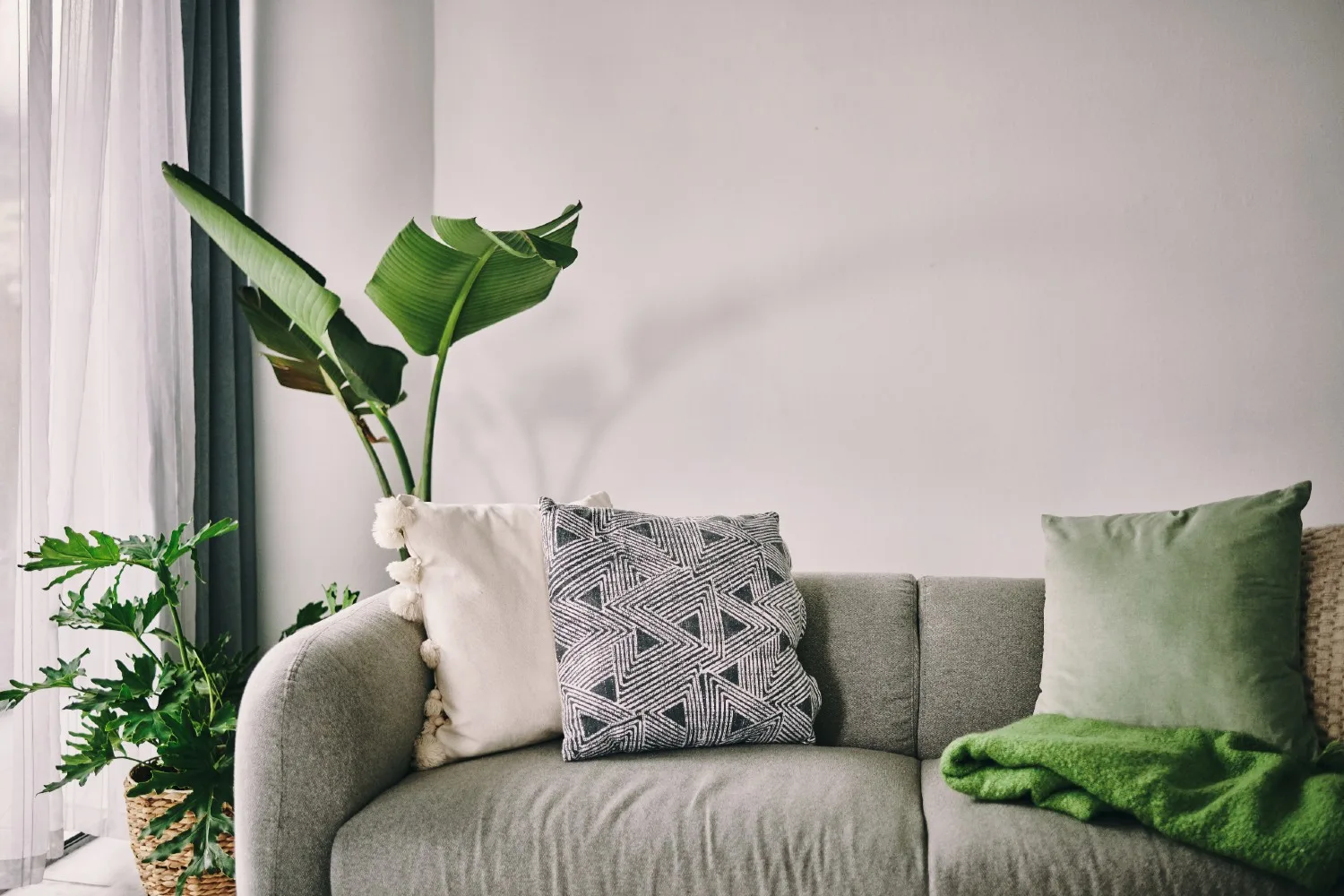 mix and max cushions on a couch