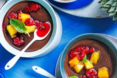 Mocha-almond pudding with mango-raspberry sauce