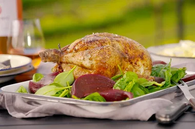 Butter-glazed rotisserie chicken with cheesy polenta