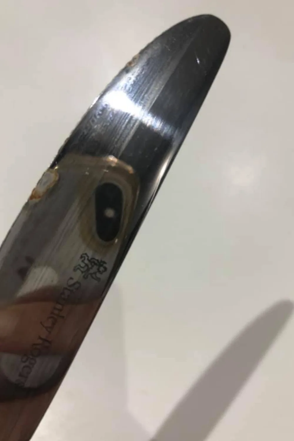 rusk mark on knife