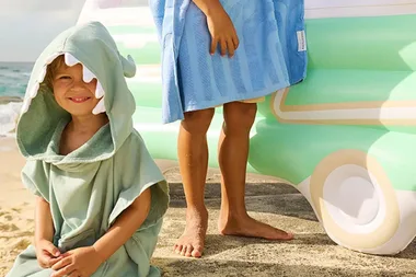 12 hooded beach towels for adults, kids and babies to wear by the water