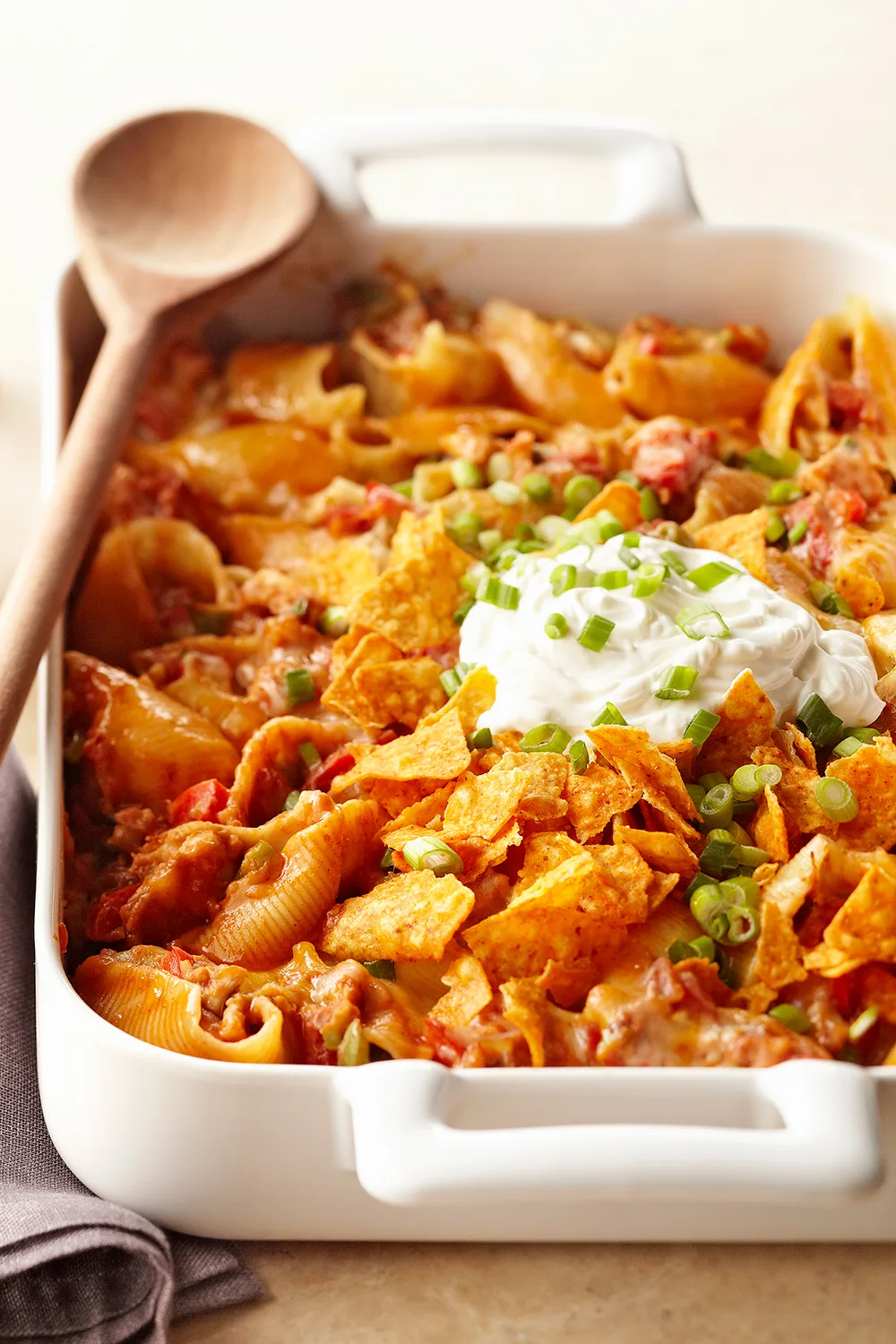 Chicken enchilada pasta leftover roast chicken recipe with doritos and sour cream on top