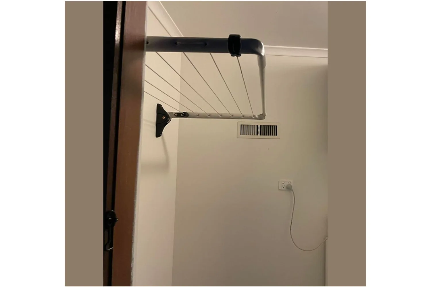 A member of the Bunnings Mums Australia Facebook group installed a clothesline next to her ducted heating vent to help dry clothes inside.