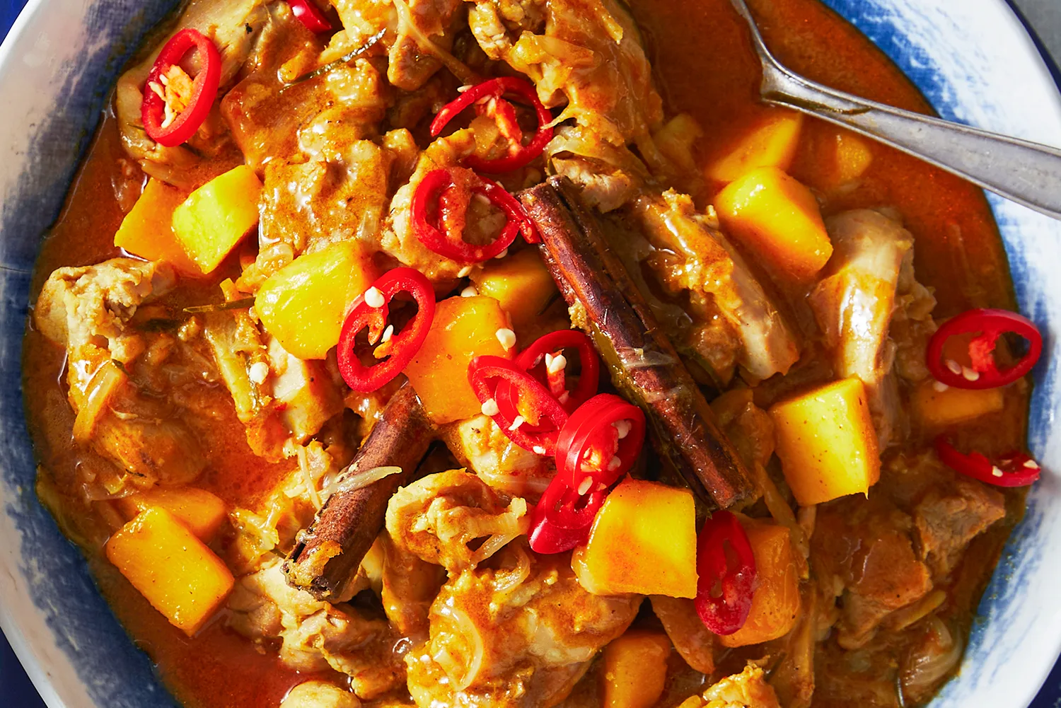 One-pot chicken and mango curry with mango-mint salsa