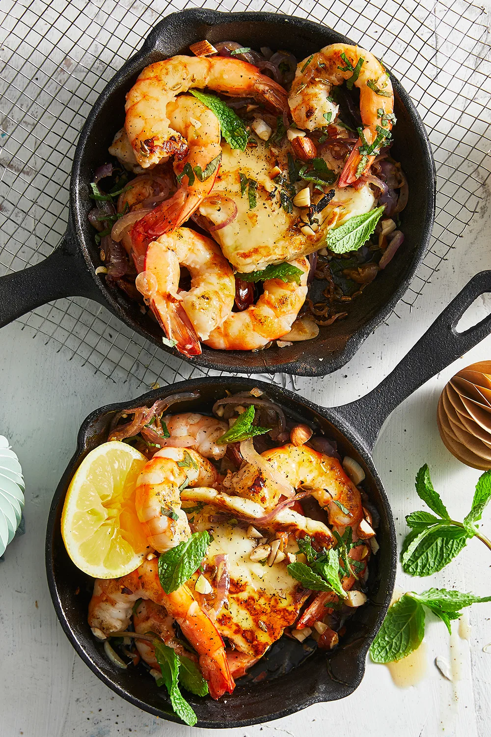 Garlic sizzle prawns with haloumi and almonds