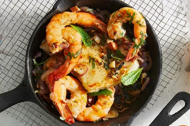 Garlic sizzle prawns with haloumi and almonds
