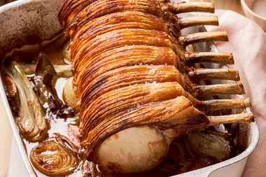 Salted roast pork rack with star-anise prunes and fennel