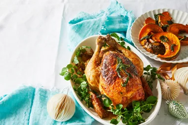 Potato-stuffed roast chicken with crispy sage and pumpkin