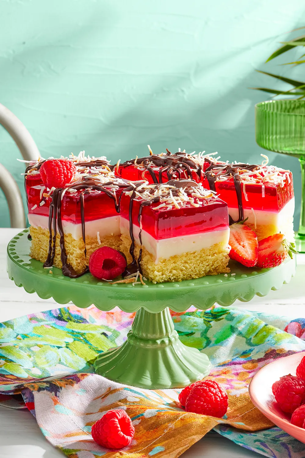 Lamington jelly slice on a cake stand