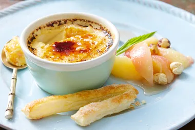 Vanilla crème brûlée with prosecco-spiked peaches