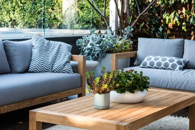 Elevate your outdoor daybed with one small décor addition: statement cushions