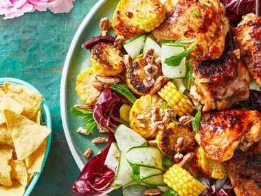 Smokey lime-glazed barbecued chicken with corn and pecan salad