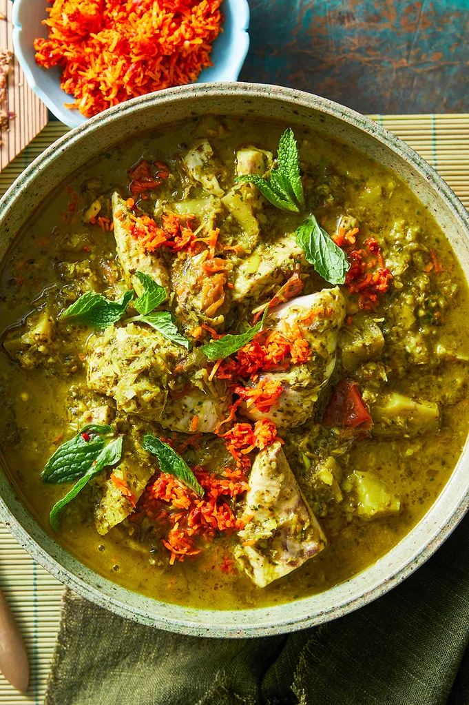 Combine fish sauce, lime juice, coconut milk and spinach in a food processor; purée until very smooth. Add half to pan with eggplant and tomatoes; simmer gently for 10 minutes. Cut fish into large pieces and add to pan with remaining sauce. Cook for 5 minutes, until fish is just tender. Garnish with mint. Serve with shallots and sambal.