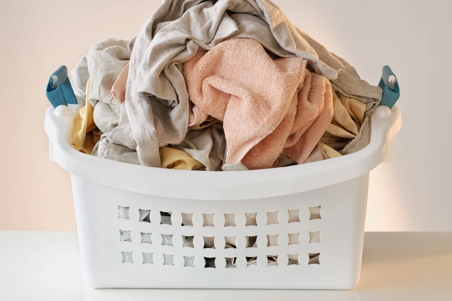 This magic laundry basket with legs is a game-changer for anyone with back issues