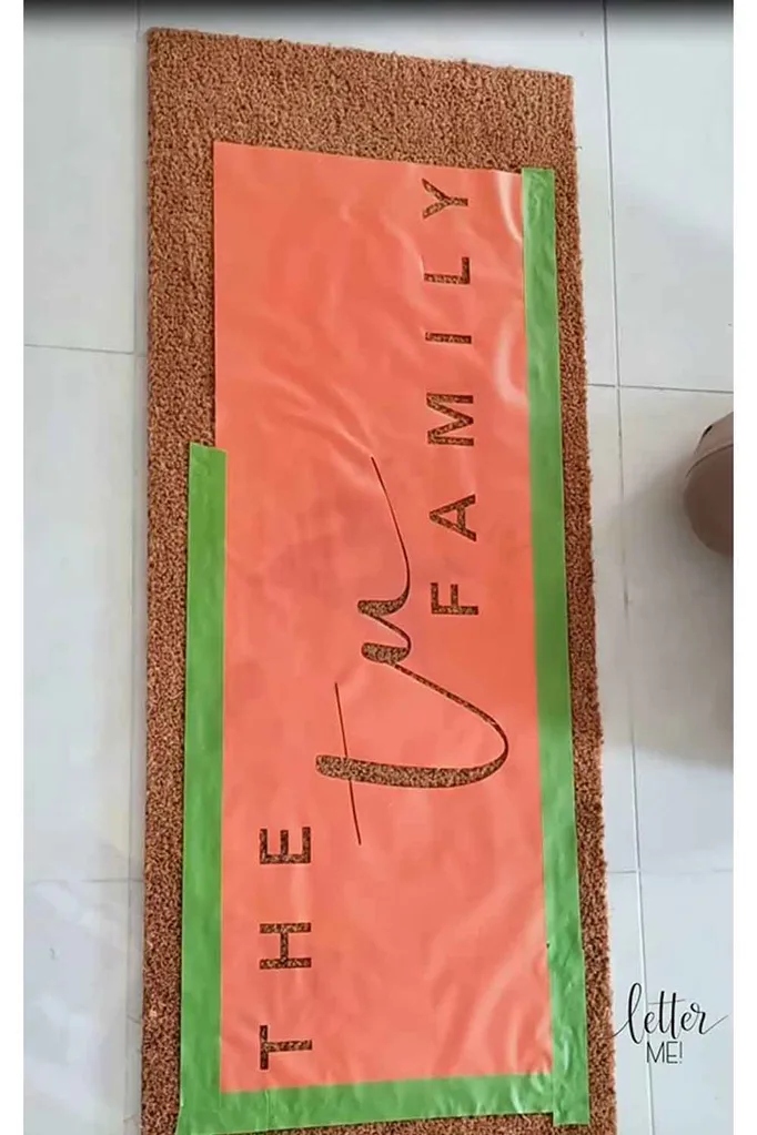 diy door mat applying the stencil