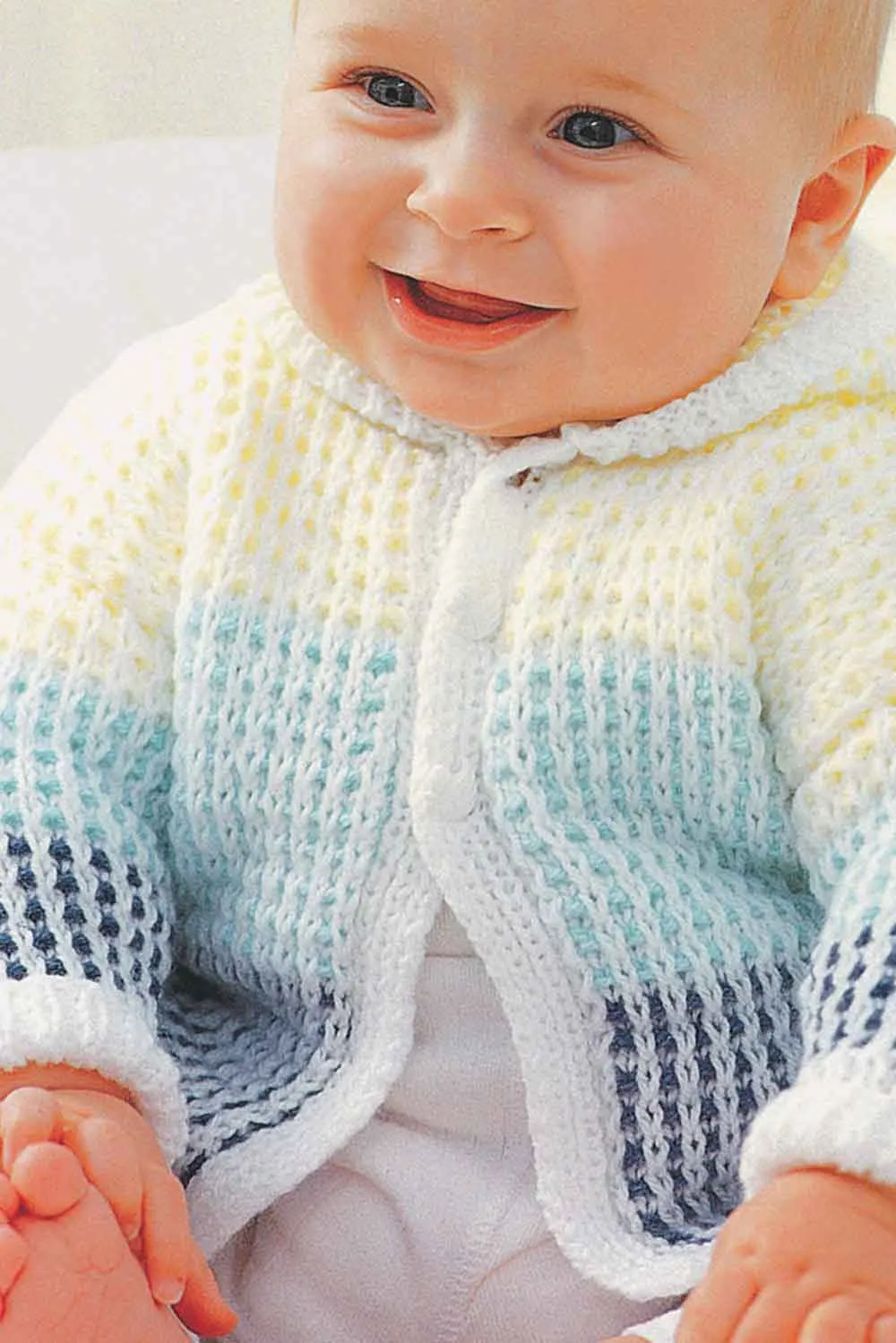 Patons hooded cardigan free knitting pattern for babies.