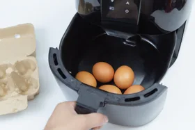 air fryer with eggs in it
