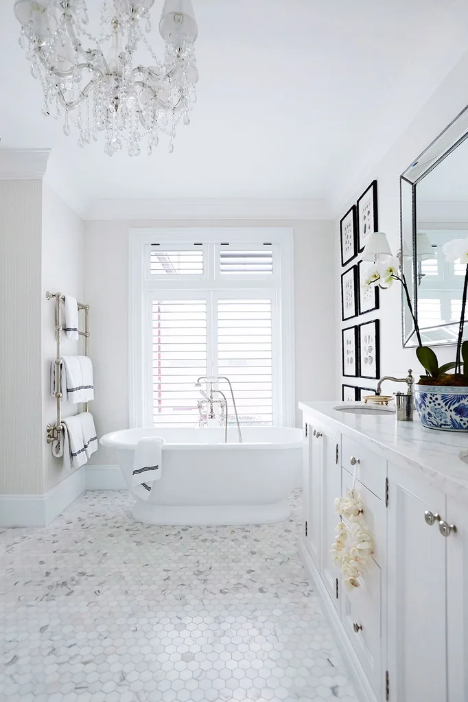White bathroom with chandelier