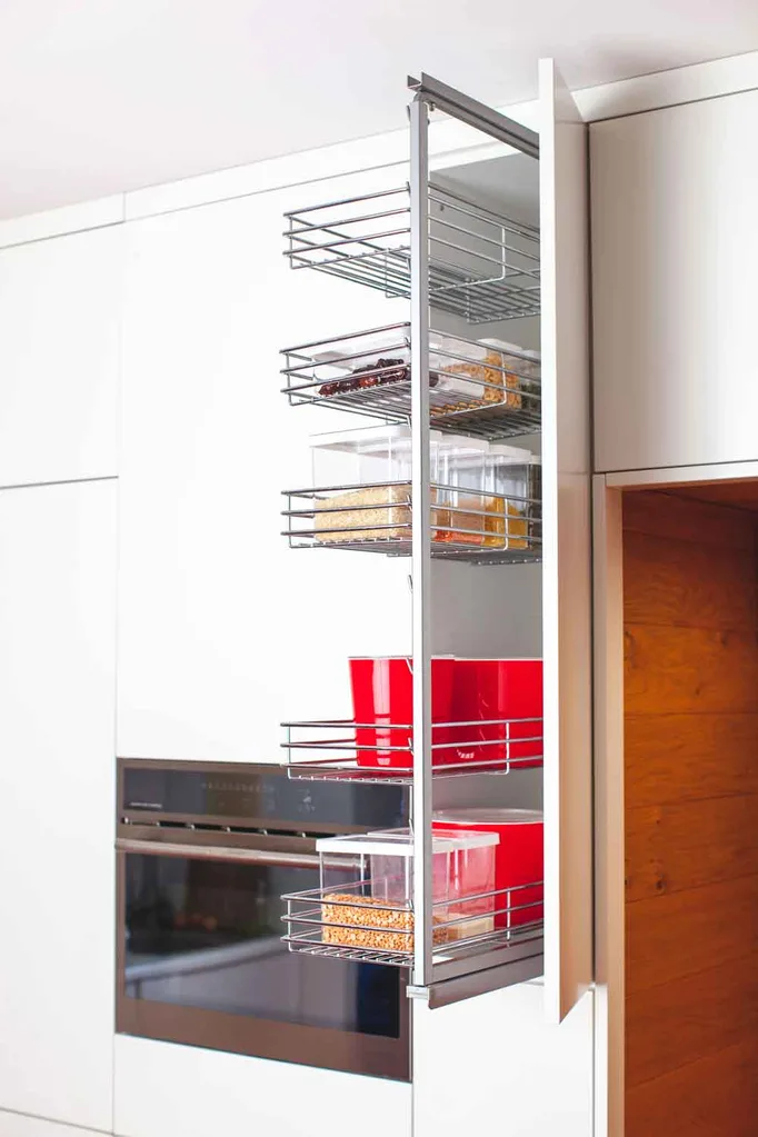 pullout storage shelves to organise a kitchen pantry