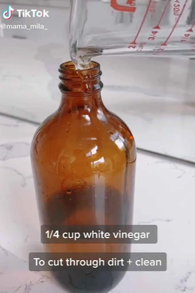 picture of glass bottle with dust repellent spray in it