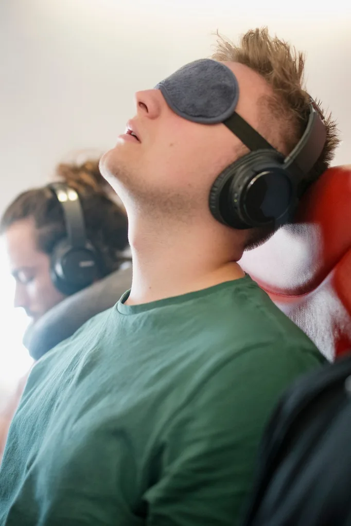 how to sleep on a plane