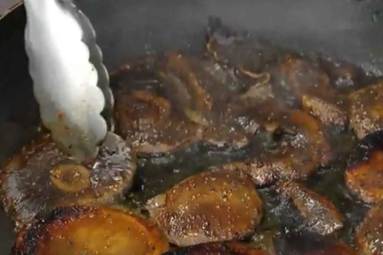 crispy mushroom bacon cooked in a pan