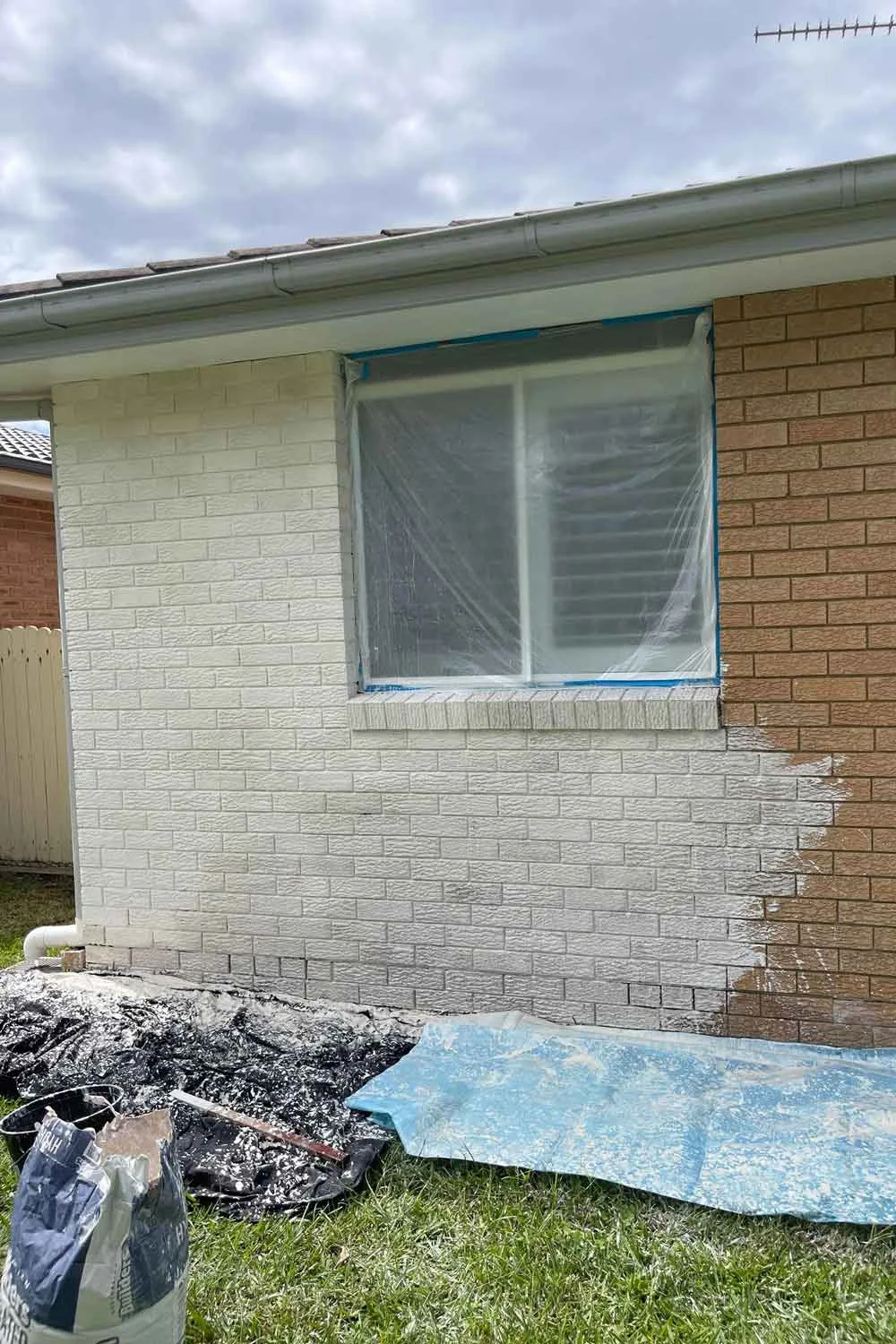 Applying limewash to a brick house can take a few days but is very affordable.