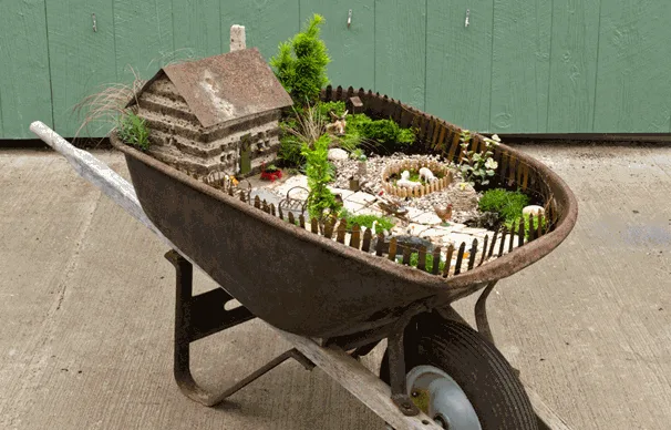 wheelbarrow fairy garden