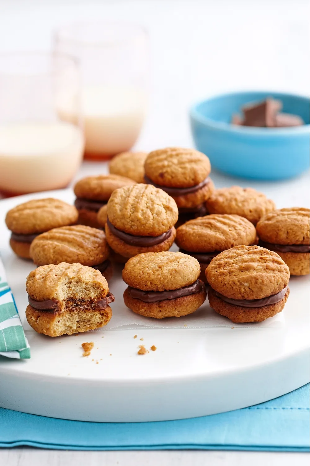 homemade kingston biscuits on a plate, with chocolate cream filling