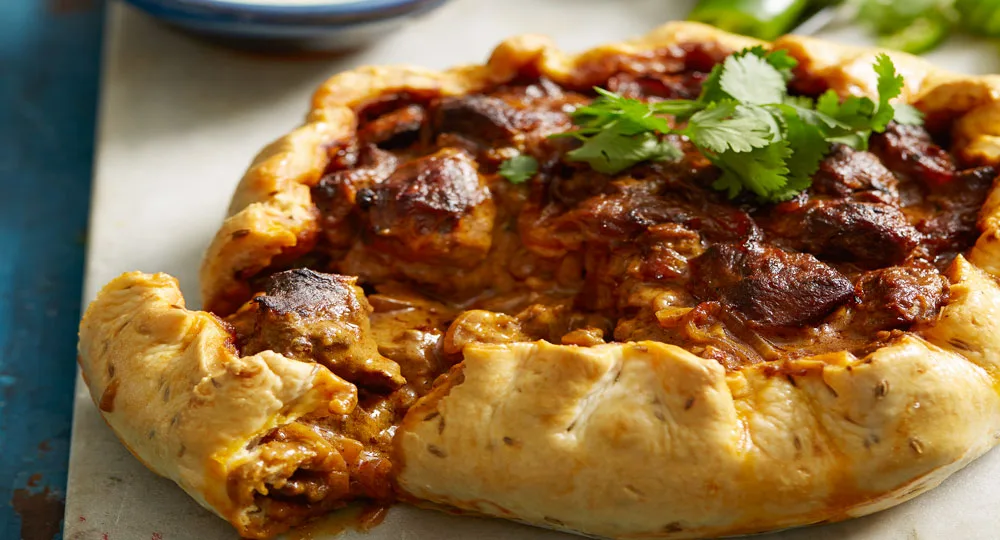 Indian lamb curry pie with green chilli sauce - Better Homes & Gardens Australia