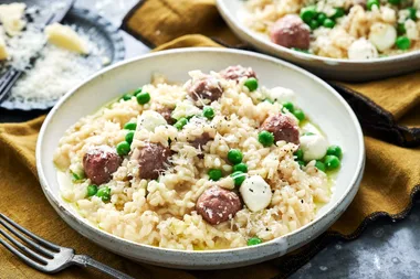 Risotto with cevapcici meatballs, peas and bocconcini