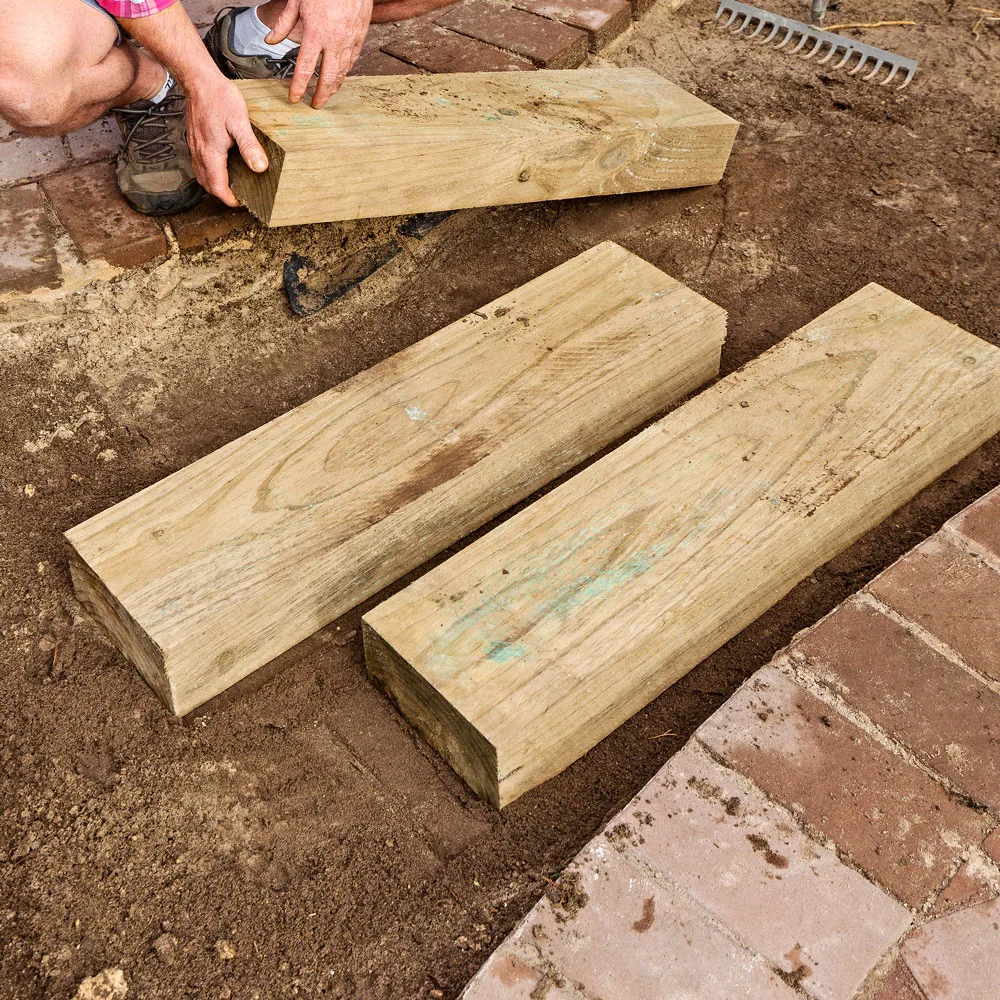 Step 3 involves adding wooden steppers to the area around the metal arbour.