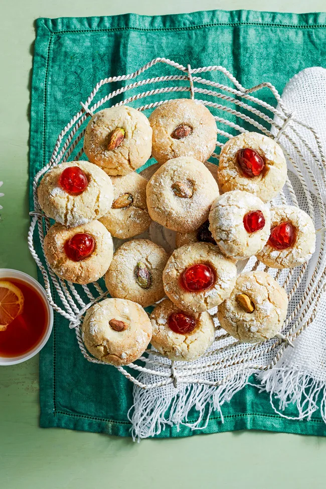 lemon biscotti with chrries and almonds pressed into the top