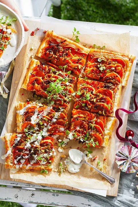 sweet potato leek galette christmas entree with sprinkled sprouts on top as garnish