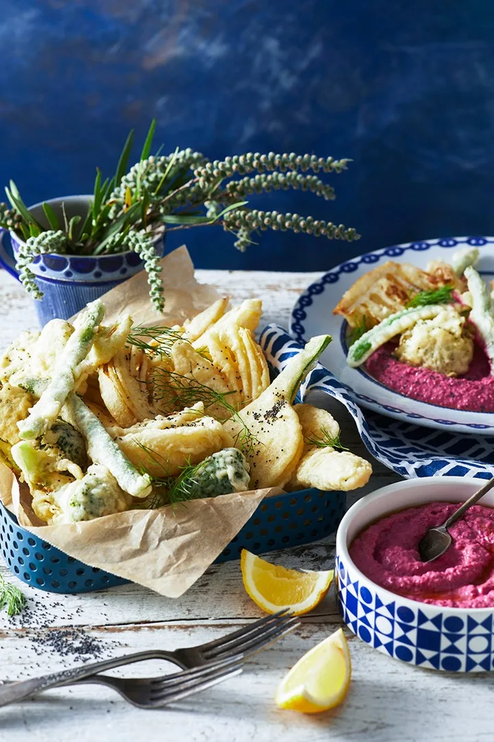 vegie tempura beetroot hummus with vegies in pile and dip on the side in blue patterned bowl as christmas entree