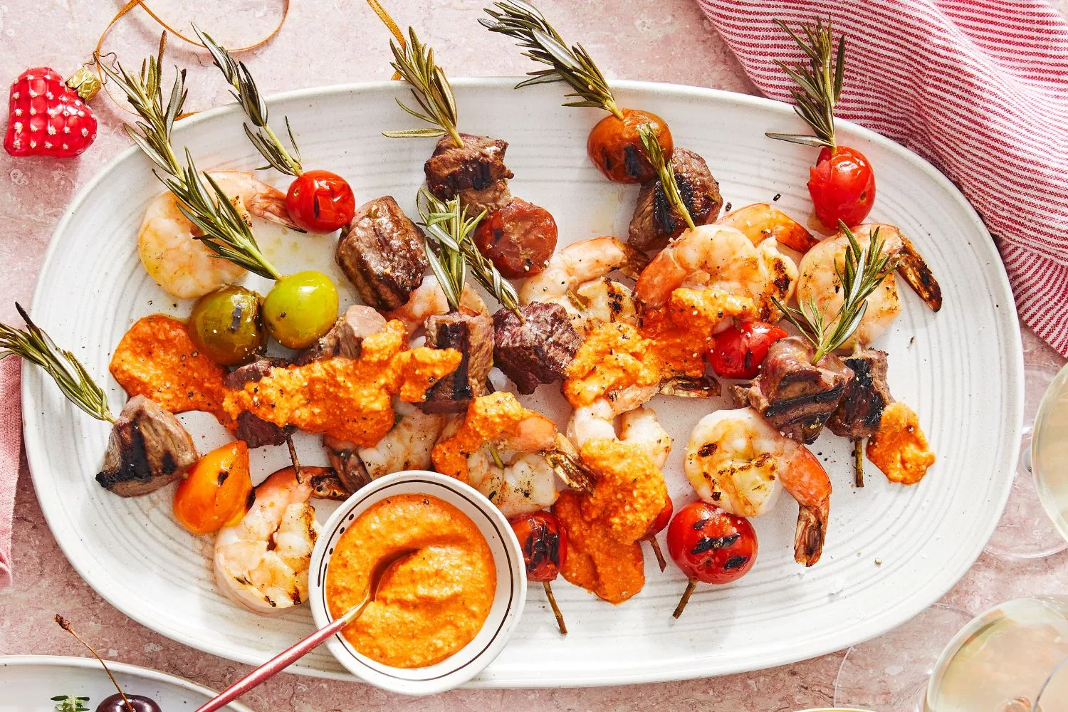 Surf and turf rosemary skewers with romesco sauce