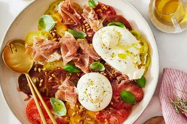 Tomato, prosciutto and burrata salad with pine nuts
