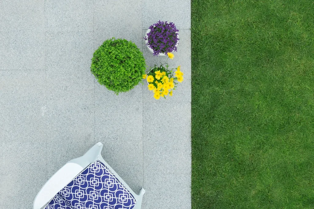 granite pavers and a green lawn