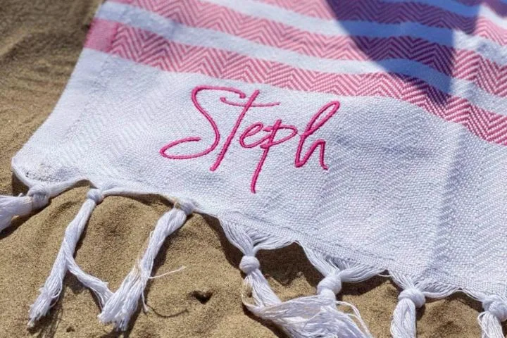 Embroidered stripe beach towel