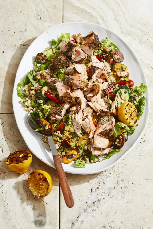summer-salad-salmon salad ideas for dinner in bowl with roasted lemon on the side
