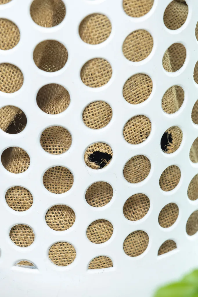 step 3 the hessian sack appears cut in 12 of the holes of the washing basket