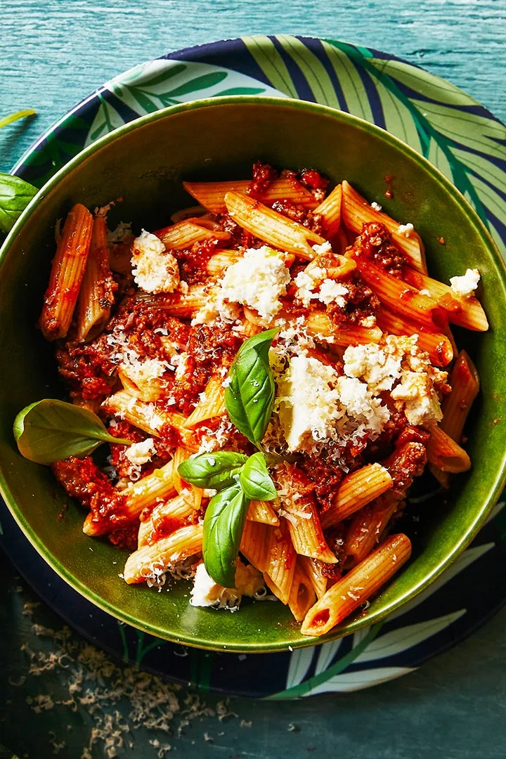 ragu bolognese with ork mince in a bowl with pasta