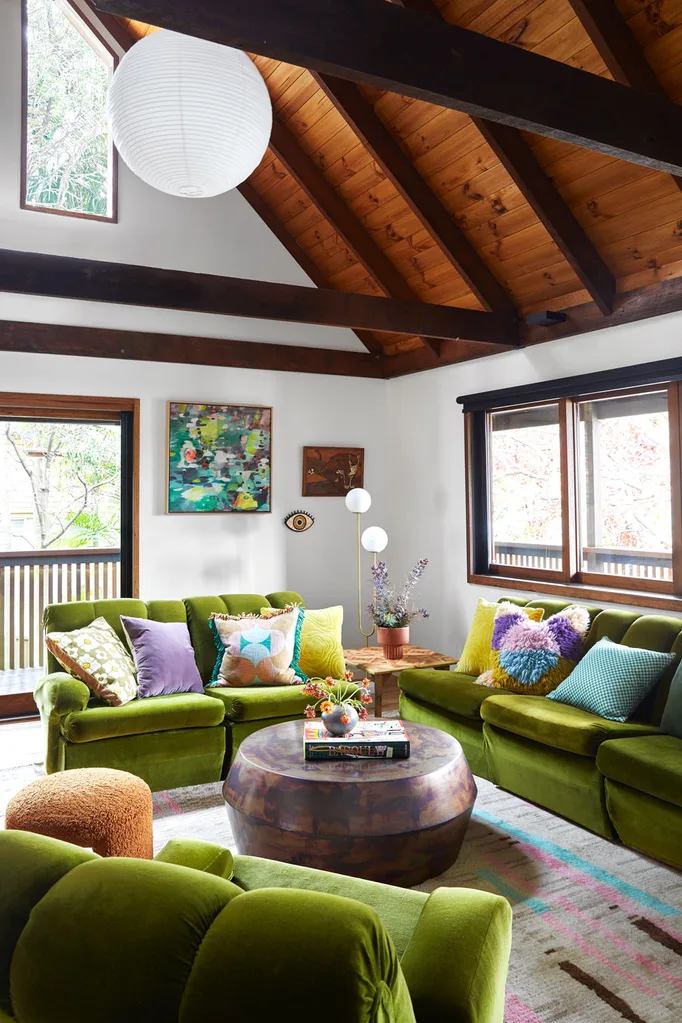 green chairs in a living room with coloured cushions using the colour rule